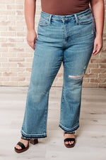 JUDY BLUE Isla Mid Rise Distressed Released Hem Bootcut Jeans