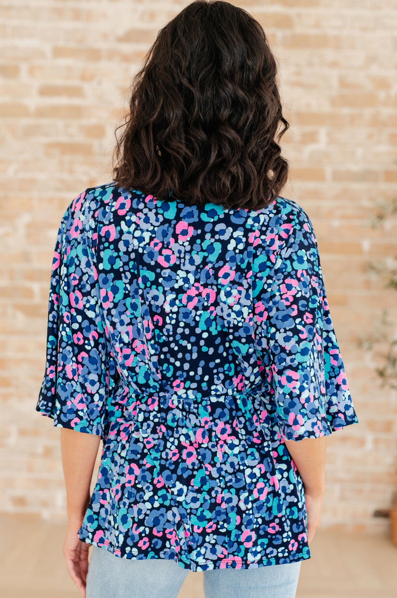 Dreamer Peplum Top in Navy and Lavender Animal Print